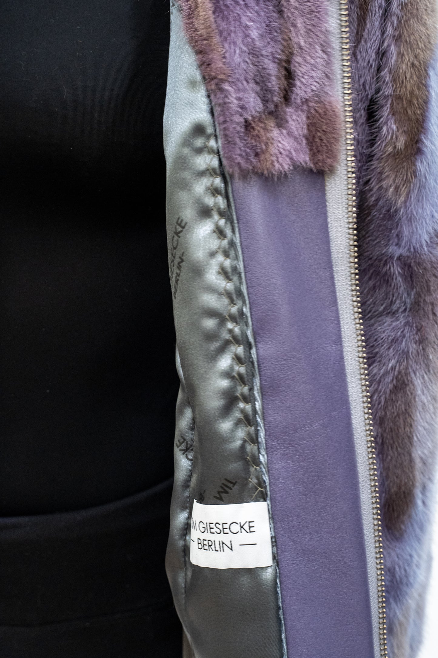Kurze Nerzjacke mit Kapuze